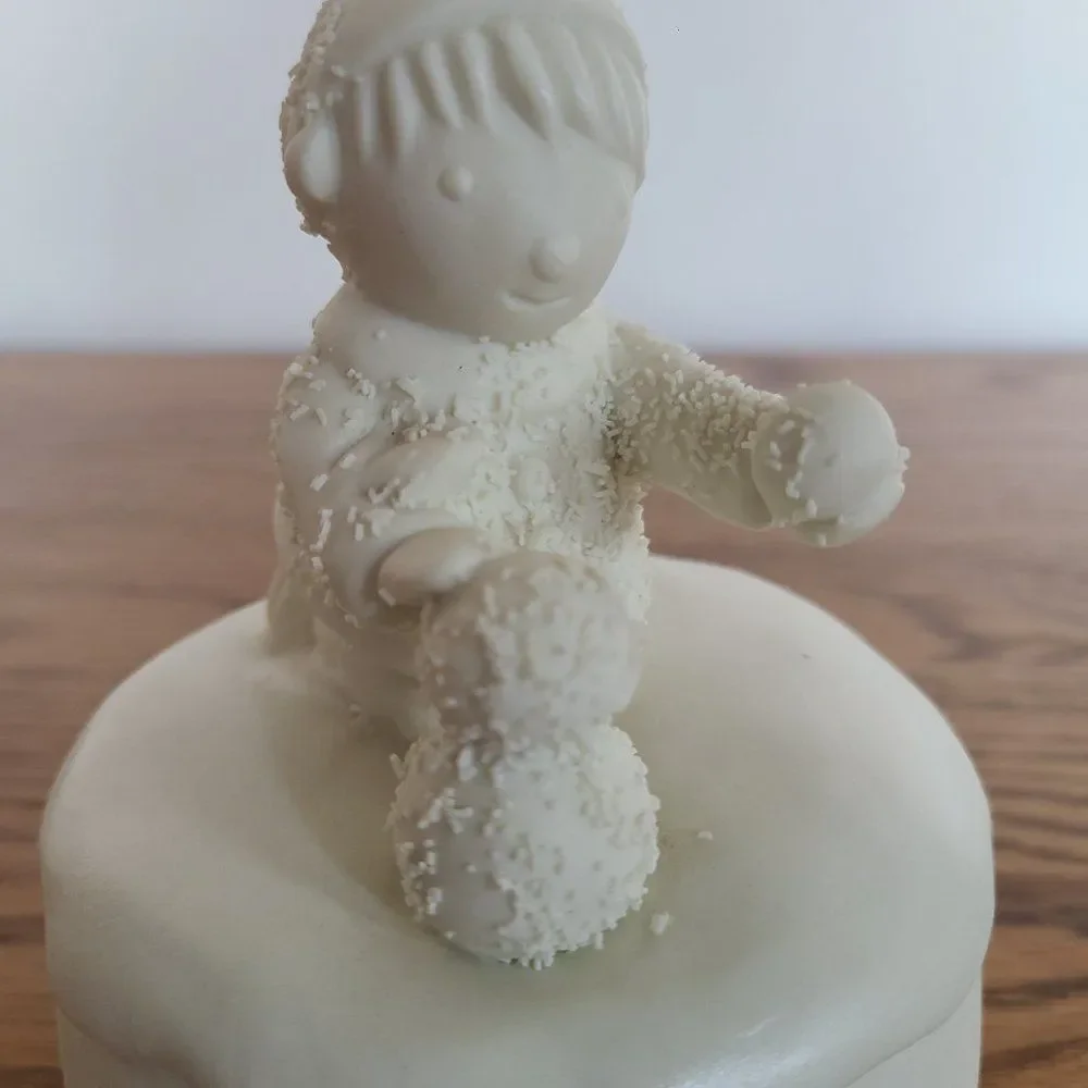 Porcelain Bisque Holiday Christmas Music Box Boy Building Snowman 